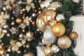 Gold and silver Christmas toys, balls garlands on a spruce branch Royalty Free Stock Photo