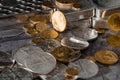 Gold & Silver Coins with Silver Bars on map Royalty Free Stock Photo