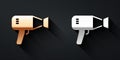 Gold and silver Hair dryer icon isolated on black background. Hairdryer sign. Hair drying symbol. Blowing hot air. Long