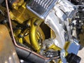 Gold and silver hot rod engine