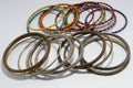 Gold,silver new design bangles jewellery on white blur background.