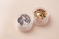 Gold and Silver Sequins for the design of nails in a box. Glitter in jars. Foil for nail service. Photo set. Sparkling beauty