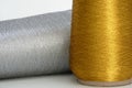 Gold and silver sewing thread - close-up Royalty Free Stock Photo