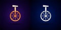 Gold and silver Unicycle or one wheel bicycle icon isolated on black background. Monowheel bicycle. Vector