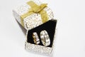 Gold silver wedding rings in a gift box on a black background Royalty Free Stock Photo