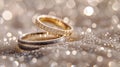 Gold and silver wedding rings rest on a glittering background..AI generated image Royalty Free Stock Photo