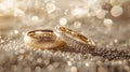 Gold and silver wedding rings rest on a glittering background..AI generated image Royalty Free Stock Photo