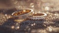 Gold and silver wedding rings rest on a glittering background..AI generated image Royalty Free Stock Photo