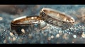 Gold and silver wedding rings rest on a glittering background..AI generated image Royalty Free Stock Photo