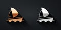 Gold and silver Yacht sailboat or sailing ship icon isolated on black background. Sail boat marine cruise travel. Long