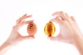 Gold and simple egg in hands Royalty Free Stock Photo