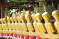 Gold sitting buddha statue row in temple of Thailand Royalty Free Stock Photo