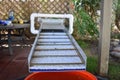 Gold Sluice Set Up on Back Yard Patio with Bucket