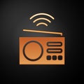 Gold Smart radio system icon isolated on black background. Internet of things concept with wireless connection. Vector