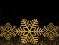 Gold snowflakes and glitter on dark background for Merry Christmas and Happy New Year greeting card. Royalty Free Stock Photo