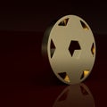 Gold Soccer football ball icon isolated on brown background. Sport equipment. Minimalism concept. 3D render illustration Royalty Free Stock Photo