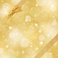 Gold sparkling background with gold ribbon