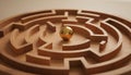 Gold sphere positioned near center of complex circular wooden maze puzzle symbolizing challenge problem solving and path Royalty Free Stock Photo