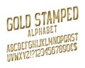 Gold stamped alphabet witn numbers, dollar and euro currency signs, exclamation and question marks Royalty Free Stock Photo