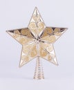 Gold star Christmas tree decoration on white background