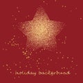 Gold star on a festive red star burst background with glitter burst Royalty Free Stock Photo