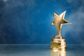 gold star trophy in smoke Royalty Free Stock Photo