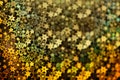 Gold stars shimmer in different shades, starry bokeh, background Royalty Free Stock Photo