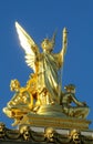 Gold statue of an angel on a catholic cathedral roof Royalty Free Stock Photo