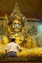 Gold statue of Buddha in Mahamuni temple, Myanmar