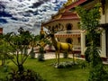 Gold statue of an elk at Wat That Phoun temple standing in the f Royalty Free Stock Photo