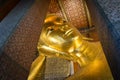 The gold statue Reclining Buddha at Wat Pho