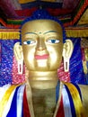 Gold statue of seated Shakyamuni Buddha at Shey Palace.