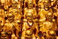 A lot of gold statues of the Lohans in Longhua Temple in Shanghai, China. Famous buddhist temple in China Royalty Free Stock Photo