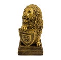 Gold statuette of a lion with shield isolated on a white background Royalty Free Stock Photo
