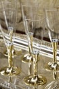 Gold stemmed champagne glasses