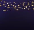 Gold string Christmas lights in black and blue background for decoration and Abstract Holiday Background
