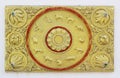 The gold stucco design of native Thai style on the Wall.