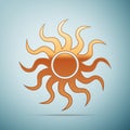 Gold Sun-sign icon on blue background Royalty Free Stock Photo