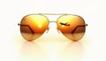 Gold sunglasses reflect sunset and airplane, white background Royalty Free Stock Photo