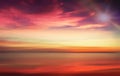 Gold sunset pink blue colorful sky white fluffy clouds sea water wave reflection nature landscape seascape Royalty Free Stock Photo