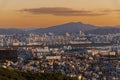 Sunset of Seoul cityscapes with high rise office buildings and skyscrapers in Seoul city, Republic of Korea in winter blue Royalty Free Stock Photo