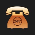 Gold Telephone 24 hours support icon isolated on black background. All-day customer support call-center. Open 24 hours a Royalty Free Stock Photo
