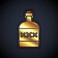Gold Tequila bottle icon isolated on black background. Mexican alcohol drink. Vector Royalty Free Stock Photo