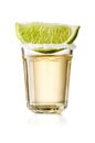 Gold Tequila Glass Shot With Lime Slice and Salty Rim, Isolated on White Background Royalty Free Stock Photo