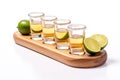 Gold tequila shot with lime isolated on white background Royalty Free Stock Photo