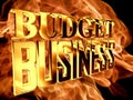 Gold text budget business on fire background Royalty Free Stock Photo