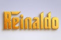 Gold text effect of Spanish name Reinaldo on light-blue background. Royalty Free Stock Photo