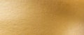 Gold texture background. Golden shiny foil paper panorama. Soft shine gradient reflection Royalty Free Stock Photo
