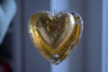 Gold textured Christmas heart decoration Royalty Free Stock Photo