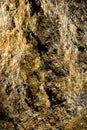 Gold textured rock surface